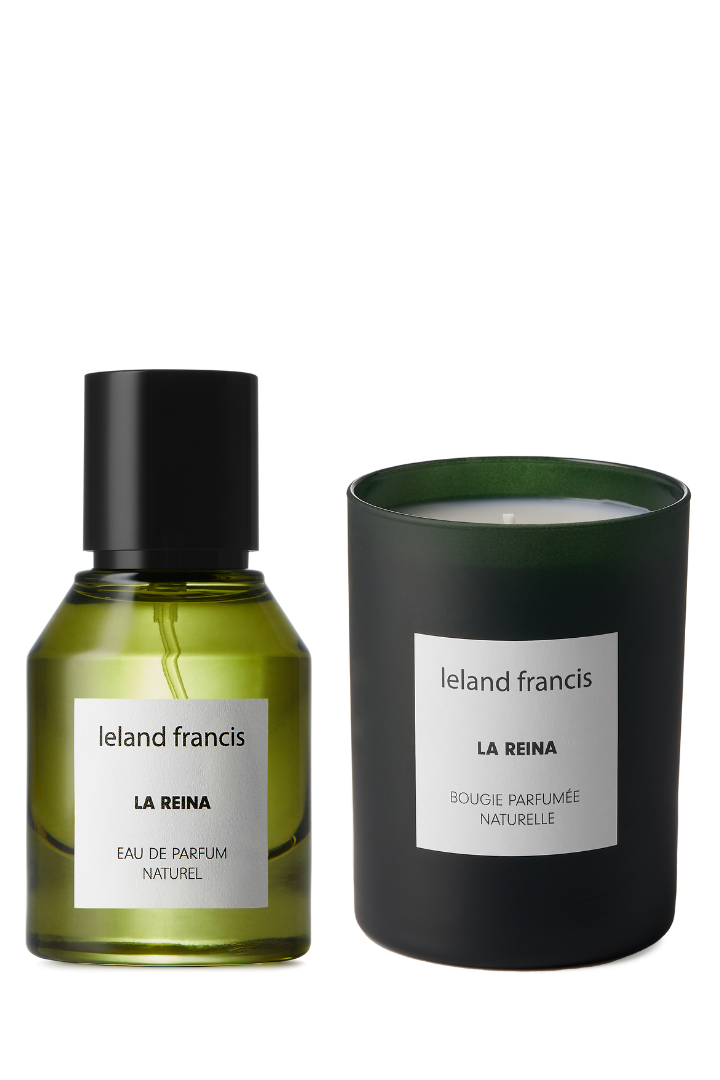 Ieland Francis La Reina eau de parfum bottle and candle on a white background