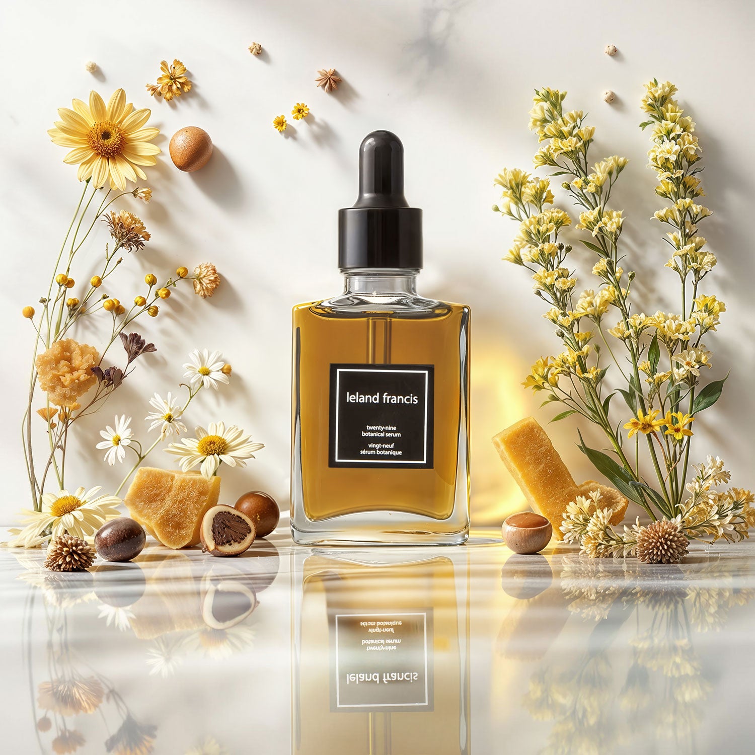 A clear black glass bottle with a dropper containing amber-colored liquid, labeled 'Twenty-Nine Botanical Serum'.