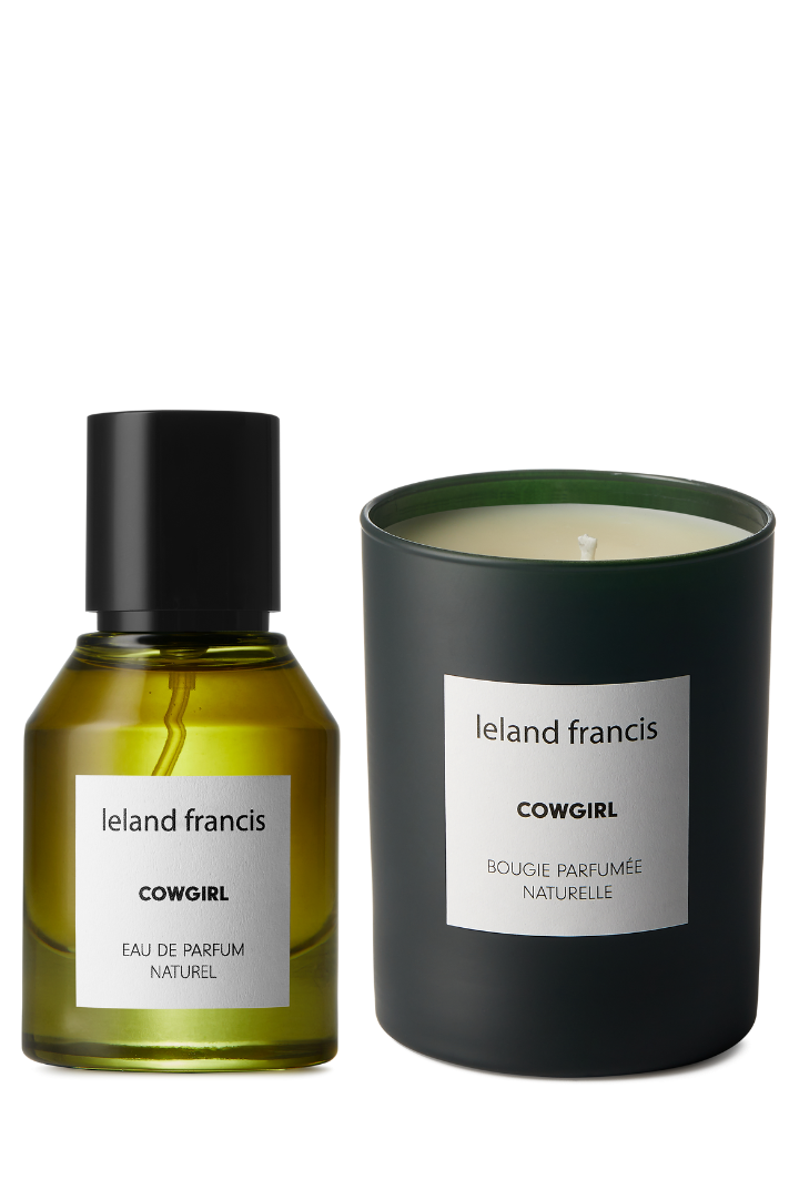 Ieland Francis Cowgirl eau de parfum bottle and candle on a white background