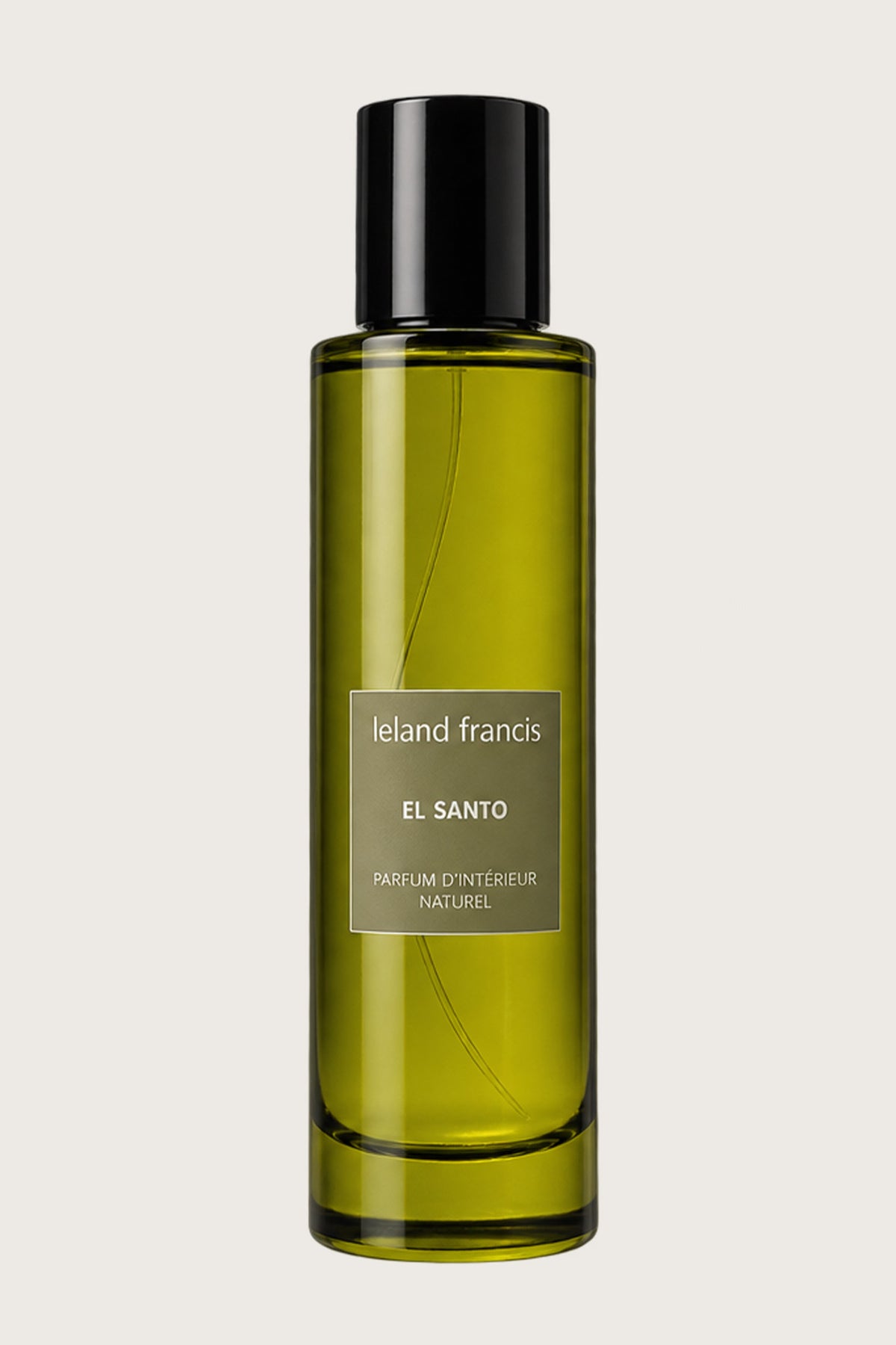 El Santo Room Spray bottle on a gray background