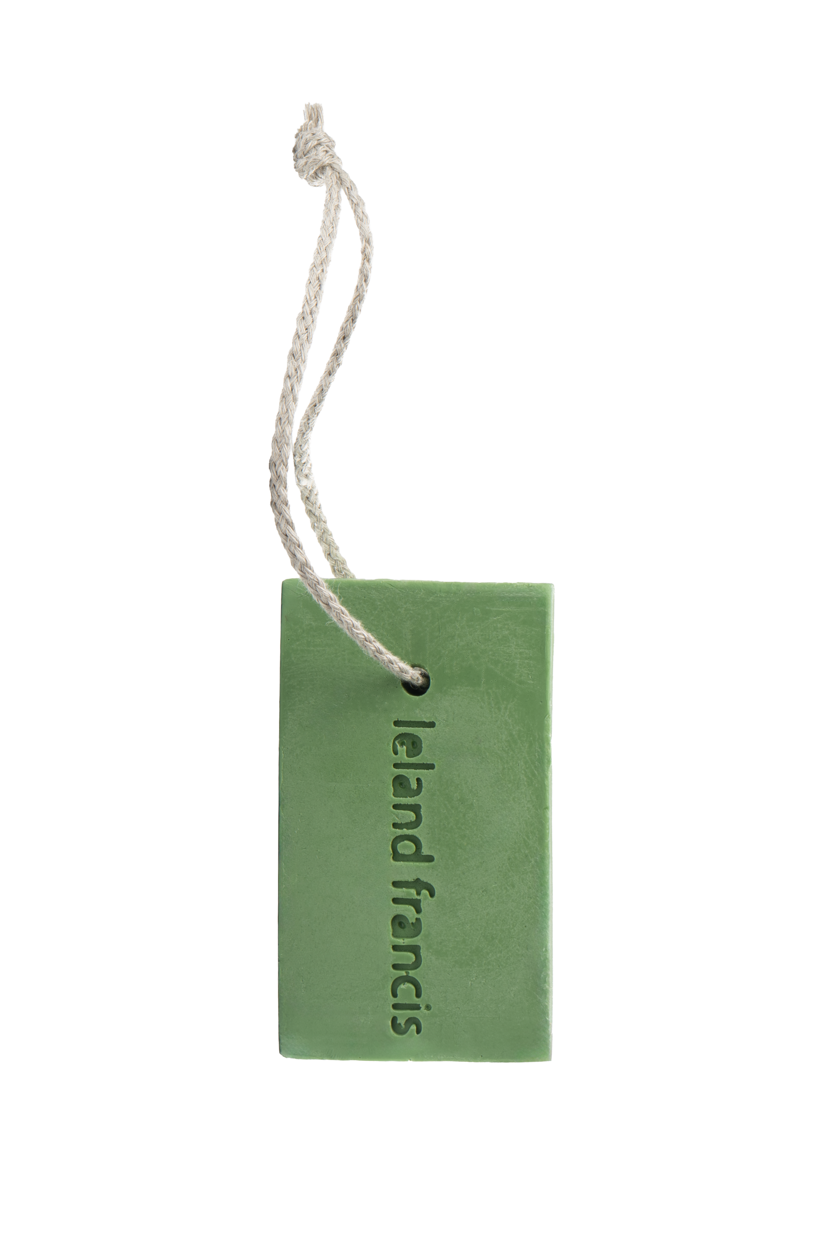 Green bar soap on a rope with 'Ieland Francis' text on a white background