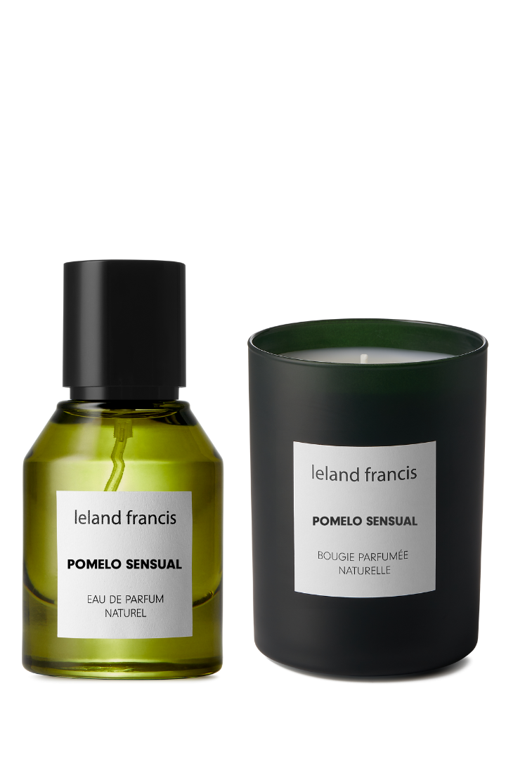 Ieland francis Pomelo Sensual perfume bottle and candle on a white background